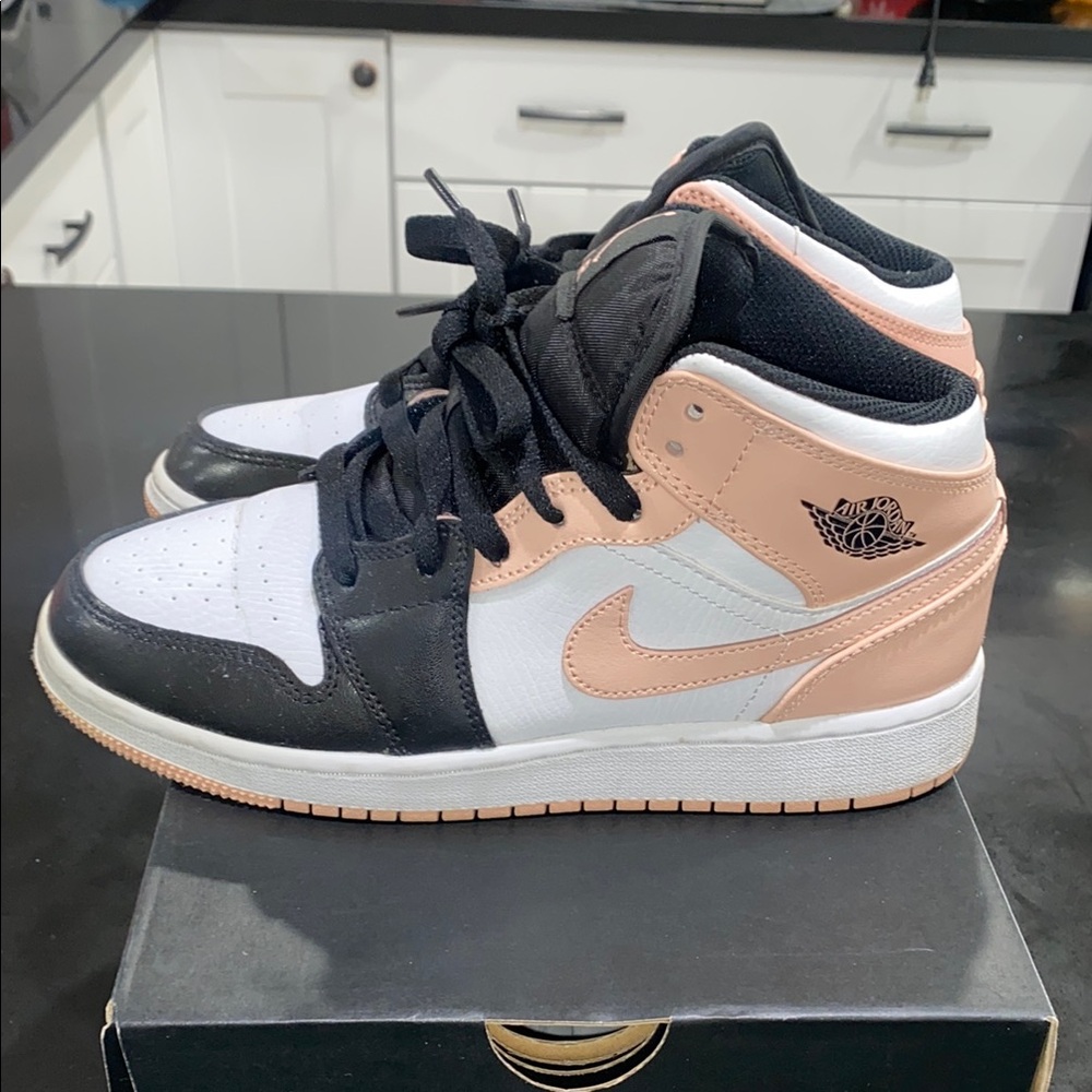 Jordan Black and Pink Sneakers with High-Top Design and Iconic Swoosh